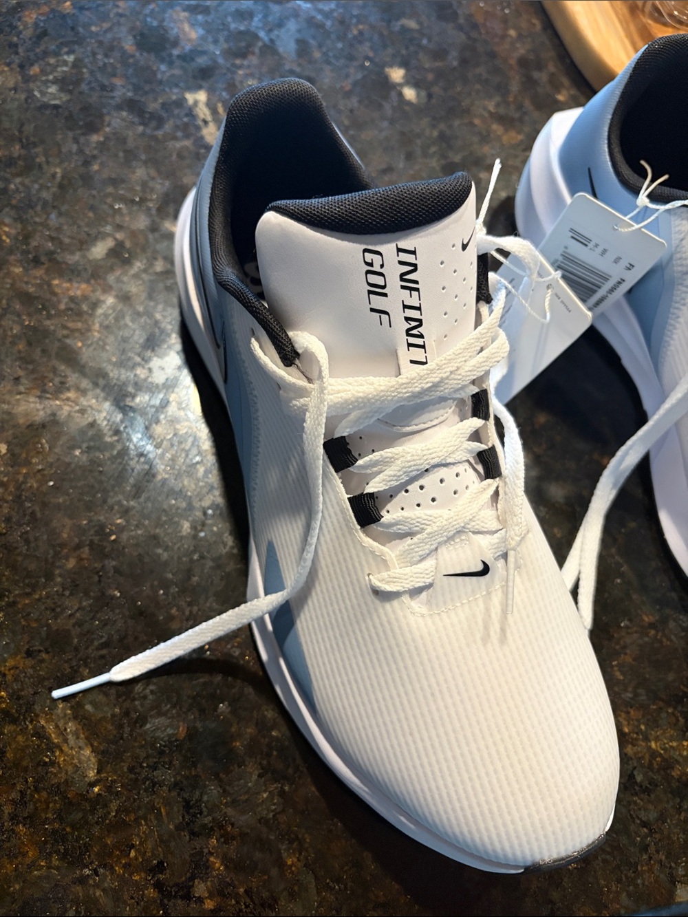 Nike Men’s White and North Carolina Blue Infinity Golf Shoes